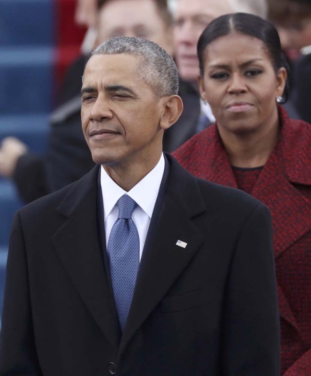 President Barack Obama and First Lady Michelle Obama look on at inauguration ceremonies swearing in Donald Trump as the 45th president of the United States on the West front of the U.S. Capitol in Washington, U.S., January 20, 2017. REUTERS/Carlos Barria