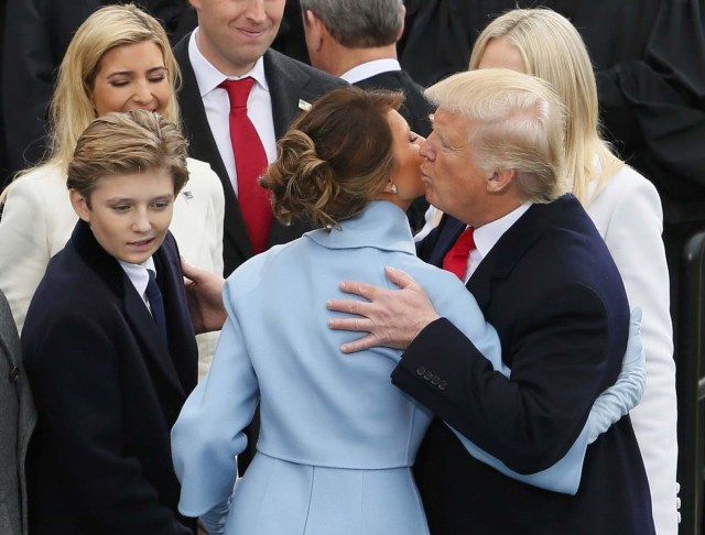 President Donald Trump kisses his wife Meliana after being sworn-in as the 45th president of the United States at the inauguration ceremonies swearing in Donald Trump as the 45th president of the United States on the West front of the U.S. Capitol in Washington, U.S., January 20, 2017. REUTERS/Rick Wilking