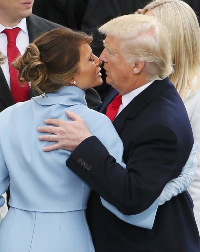 President Donald Trump kisses his wife Meliana after being sworn-in as the 45th president of the United States at the inauguration ceremonies swearing in Donald Trump as the 45th president of the United States on the West front of the U.S. Capitol in Washington, U.S., January 20, 2017. REUTERS/Rick Wilking