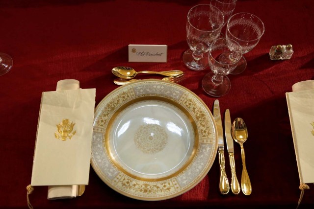 A table is prepared for U.S. President Donald Trump before the Inaugural Luncheon with members of Congress in Statuary Hall on Capitol Hill in Washington, U.S., January 20, 2017. REUTERS/Yuri Gripas