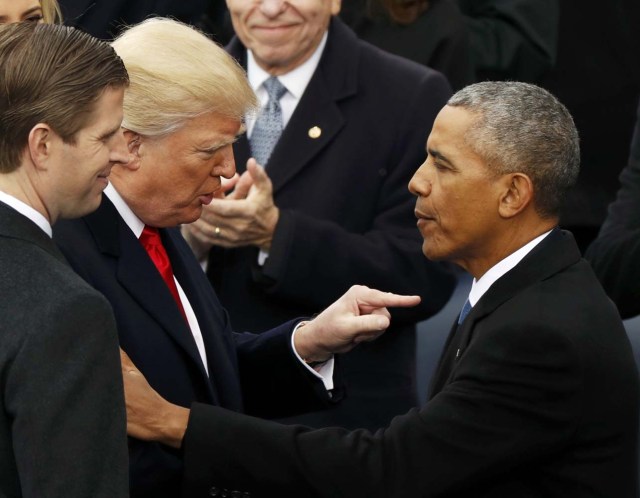 US President Donald Trump and son Eric Trump speak with outgoing President Barack Obama during inauguration ceremonies at the U.S. Capitol in Washington, U.S., January 20, 2017. REUTERS/Kevin Lamarque