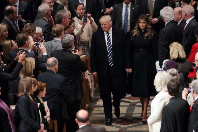 U.S. President Donald Trump and First Lady Melanie Trump arrive to a church service at the National Cathedral in Washington, U.S., January 21, 2017. REUTERS/Carlos Barria