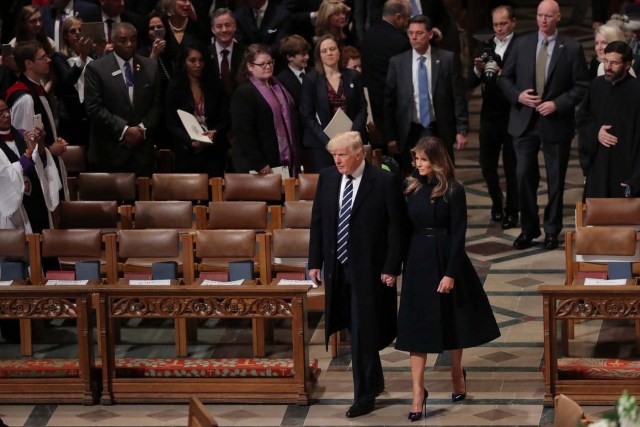 U.S. President Donald Trump and First Lady Melanie Trump arrive to a church service at the National Cathedral in Washington, U.S., January 21, 2017. REUTERS/Carlos Barria