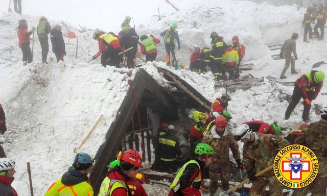 Rescue workers search around the Hotel Rigopiano in Farindola, central Italy, hit by an avalanche, in this undated picture released on January 22, 2017 provided by Alpine and Speleological Rescue Team. Soccorso Alpino Speleologico Lazio/Handout via REUTERS    ATTENTION EDITORS - THIS IMAGE WAS PROVIDED BY A THIRD PARTY. EDITORIAL USE ONLY. NO RESALES. NO ARCHIVE.