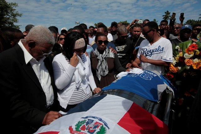 Marisol Hernandez mother of Yordano Ventura, a Kansas City Royals baseball player who died in a car crash, among other relatives stands next to the coffin during the funeral at the Municipal Baseball Stadium of Las Terrenas, Dominican Republic