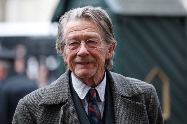 FILE PHOTO: Actor John Hurt arrives for a memorial service for actor and director Richard Attenborough at Westminster Abbey in London March 17, 2015. REUTERS/Suzanne Plunkett/File photo