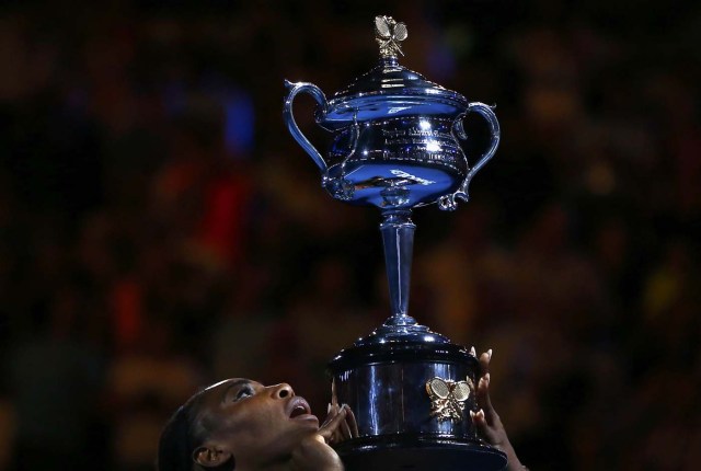 Tennis - Australian Open - Melbourne Park, Melbourne, Australia - 28/1/17 Serena Williams of the U.S. holds her trophy after winning her Women's singles final match against Venus Williams of the U.S. .REUTERS/Thomas Peter
