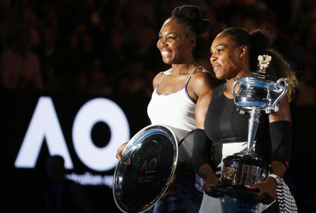 Tennis - Australian Open - Melbourne Park, Melbourne, Australia - 28/1/17 Serena Williams of the U.S. holds her trophy after winning her Women's singles final match against Venus Williams of the U.S. .REUTERS/Edgar Su   TPX IMAGES OF THE DAY