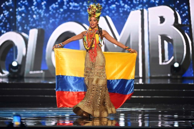 This photo taken on January 26, 2017 shows Miss Universe contestant Andrea Tovar of Colombia presents during the national costume and preliminary competition of the Miss Universe pageant at the Mall of Asia arena in Manila. / AFP PHOTO / TED ALJIBE