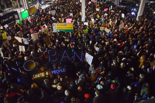 NEW YORK, NY - JANUARY 28: Protestors rally during a demonstration against the Muslim immigration ban at John F. Kennedy International Airport on January 28, 2017 in New York City. President Trump signed the controversial executive order that halted refugees and residents from predominantly Muslim countries from entering the United States. Stephanie Keith/Getty Images/AFP