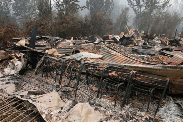 Remains of a burned down public school are seen, while wildfires ravaged wide swaths of the country's central-south regions, in town of Hualqui