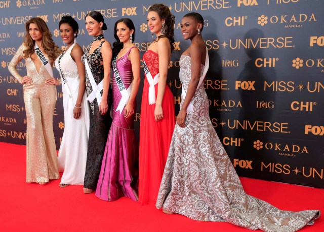Miss Universe candidates pose for a picture during a red carpet inside a SMX convention in metro Manila, Philippines January 29, 2017. In Photo from L-R: Miss Panama Keity Drennan, Miss Cayman Islands Monyque Brooks, Miss Georgia Nuka Karalashvili, Miss U.S. Virgin Islands Carolyn Carter, Miss Netherlands Zoey Ivory and Miss Sierra Leone Hawa Kamara. REUTERS/Romeo Ranoco