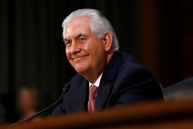 File Photo: Rex Tillerson, the former chairman and chief executive officer of Exxon Mobil, smiles during his testimony before a Senate Foreign Relations Committee confirmation hearing on his nomination to be U.S. secretary of state in Washington, U.S. January 11, 2017.  REUTERS/Jonathan Ernst/File Photo