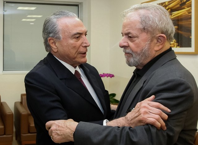 Brazil's President Michel Temer embraces former Brazilian president, Luiz Inacio Lula da Silva, in tribute to Marisa Leticia, the wife of Lula da Silva at Sirio Libanes Hospital in Sao Paulo, Brazil, February 2, 2017. Picture taken February 2, 2017. Beto Barata/ President of the Republic Press Office/Handout via Reuters ATTENTION EDITORS - THIS IMAGE WAS PROVIDED BY A THIRD PARTY. EDITORIAL USE ONLY.
