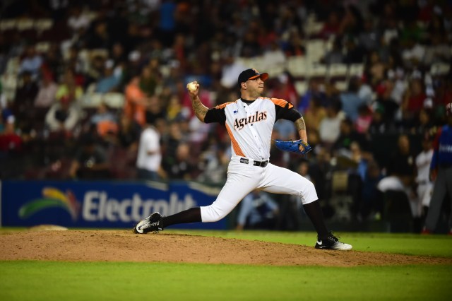 Pitcher Hassan Pena of Aguilas del Zulia from Venezuela throws against Alazanes de Granma from Cuba, during their Caribbean Baseball Series at Tomateros stadium in Culiacan, Sinaloa State, Mexico, on February 4, 2017. / AFP PHOTO / RONALDO SCHEMIDT
