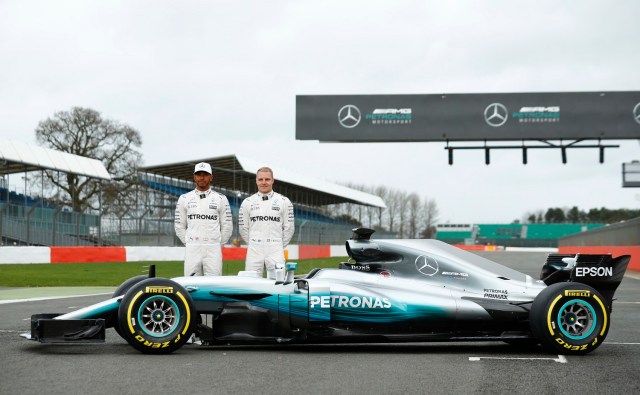Britain Formula One - F1 - 2017 Mercedes Formula One Car Launch - Silverstone - 23/2/17 Mercedes' Lewis Hamilton and Valtteri Bottas pose during the launch Reuters / Eddie Keogh Livepic EDITORIAL USE ONLY.