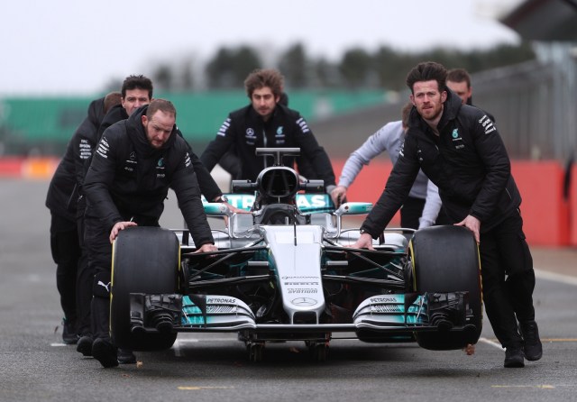 Britain Formula One - F1 - 2017 Mercedes Formula One Car Launch - Silverstone - 23/2/17 Mercedes' mechanics move the car before the launch Reuters / Eddie Keogh Livepic EDITORIAL USE ONLY.