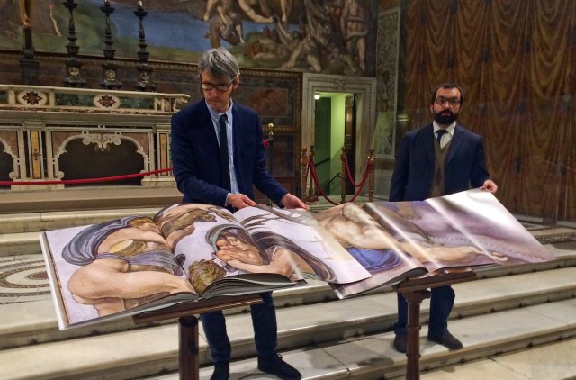 Two 1:1 scale photographic books depicting Sistine Chapel are seen during a news conference in the Sistine Chapel, the Vatican February 24, 2017. Picture taken February 24, 2017. REUTERS/Philip Pullella FOR EDITORIAL USE ONLY. NO RESALES. NO ARCHIVES.