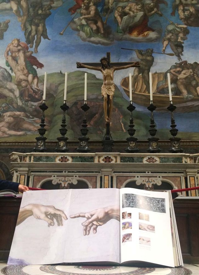 A 1:1 scale photographic book depicting Sistine Chapel is seen during a news conference in the Sistine Chapel, the Vatican February 24, 2017. Picture taken February 24, 2017. REUTERS/Philip Pullella FOR EDITORIAL USE ONLY. NO RESALES. NO ARCHIVES