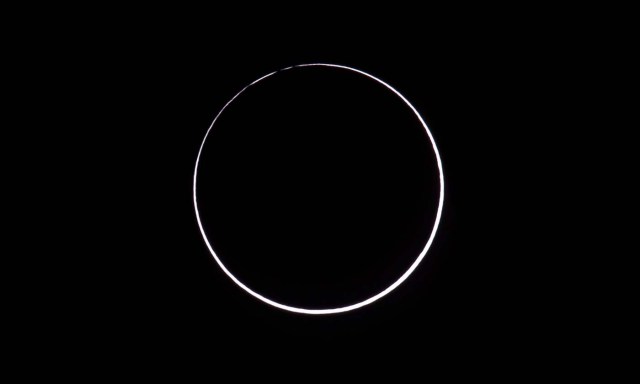 Picture taken on February 26, 2017 showing an annular solar eclipse, as seen from the Estancia El Muster, near Sarmiento, Chubut province, 1600 km south of Buenos Aires, Argentina, on February 26, 2017. Stargazers applauded as they were plunged into darkness Sunday when the moon passed in front of the sun in a spectacular "ring of fire" eclipse. / AFP PHOTO / ALEJANDRO PAGNI