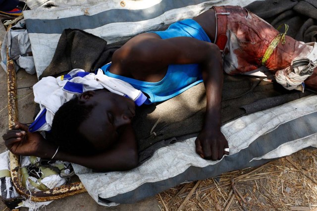 A wounded man lies on a stretcher following an armed confrontation between two communities, in Thonyor, Leer state, South Sudan, February 25, 2017. Picture taken February 25, 2017. REUTERS/Siegfried Modola