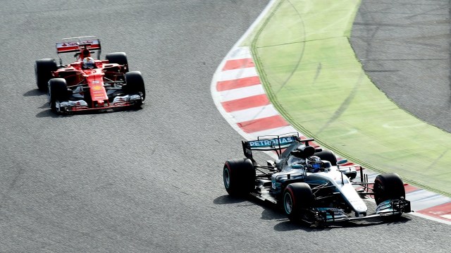 Formula One - F1 - Test session - Barcelona-Catalunya racetrack in Montmelo, Spain - 1/3/17. Mercedes' Valterri Bottas is followed by Ferrari's Sebastian Vettel. REUTERS/Albert Gea