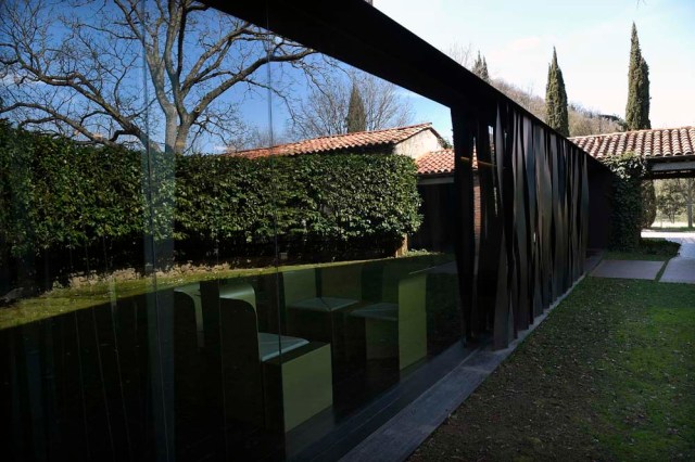 A picture taken in Olot on March 2, 2017 shows an exterior view of the restaurant "les Cols" designed by RCR architects, formed by Spanish architects, Rafael Aranda, Carme Pigem and Ramon Vialta who won yesterday the prestigious Pritzker Prize for modern works. The choice was seen as a move away from the celebrity architects that have dominated the field in favour of the homegrown vision of a trio of professionals who have worked together for 30 years in their hometown of Olot in Catalonia. / AFP PHOTO / LLUIS GENE