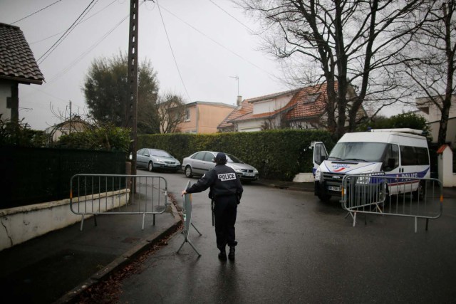 French police secure the streets around the house of the Troadec family in Orvault near Nantes, France, March 1, 2017. The couple and their two children have been missing for nearly two weeks. REUTERS/Stephane Mahe