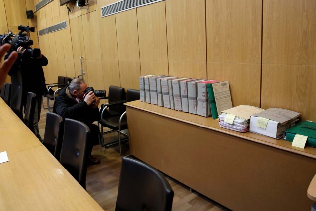 Journalists work in the courtroom before the opening of the trial of Ilich Ramirez Sanchez, known as Carlos the Jackal, in Paris, France March 13, 2017. Carlos the Jackal is appearing in a Paris court for a deadly 1974 attack at a shopping arcade in the French capital, a trial that victims’ families have been awaiting for decades. REUTERS/Benoit Tessier