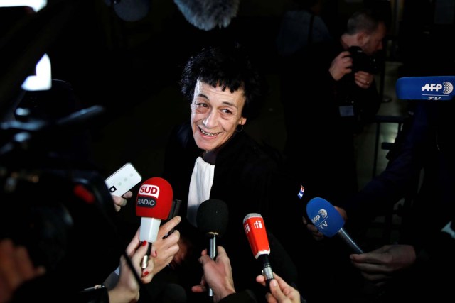 Isabelle Coutant-Peyre, lawyer and wife of Ilich Ramirez Sanchez, known as "Carlos the Jackal", talks to journalists at the courthouse before the opening of the Carlos' trial in Paris, France March 13, 2017. Carlos the Jackal is appearing in a Paris court for a deadly 1974 attack at a shopping arcade in the French capital, a trial that victims’ families have been awaiting for decades. REUTERS/Benoit Tessier