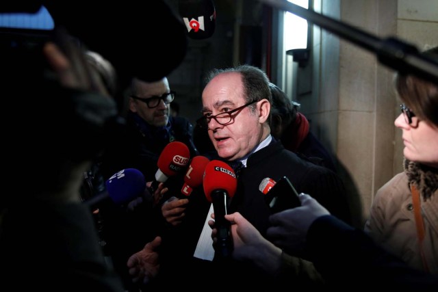 Georges Holleaux, a lawyer representing the two widows of the men killed and 16 other people affected, talks to journalists before the opening of the trial of Ilich Ramirez Sanchez, known as "Carlos the Jackal", at the courthouse in Paris, France March 13, 2017. Carlos the Jackal is appearing in a Paris court for a deadly 1974 attack at a shopping arcade in the French capital, a trial that victims’ families have been awaiting for decades. REUTERS/Benoit Tessier