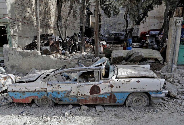 A picture taken on March 9, 2017, shows a 1957 Mercury Montclair parked outside the home of Mohammed Mohiedin Anis, or Abu Omar, in Aleppo's formerly rebel-held al-Shaar neighbourhood.  / AFP PHOTO / JOSEPH EID