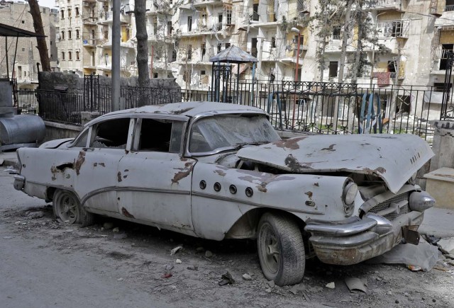 A picture taken on March 9, 2017, shows a 1955 Buick Super parked outside the home of Mohammed Mohiedin Anis, or Abu Omar, in Aleppo's formerly rebel-held al-Shaar neighbourhood.  / AFP PHOTO / JOSEPH EID