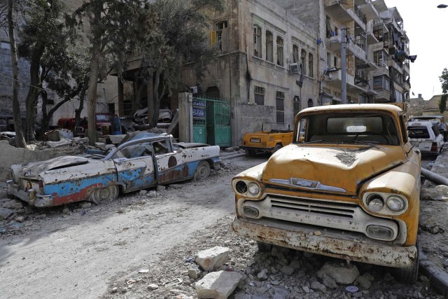 A picture taken on March 9, 2017, shows a 1958 Chevrolet Apache truck parked outside the home of Mohammed Mohiedin Anis, or Abu Omar, in Aleppo's formerly rebel-held al-Shaar neighbourhood.  / AFP PHOTO / JOSEPH EID