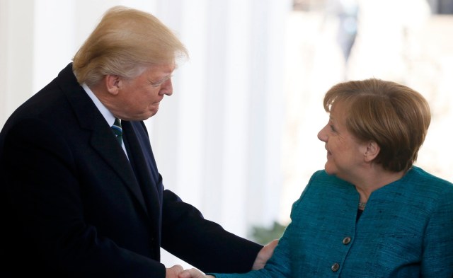 U.S. President Donald Trump welcomes German Chancellor Angela Merkel at the White House in Washington, U.S., March 17, 2017.   REUTERS/Jim Bourg