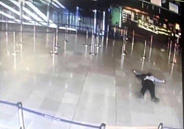 An airport CCTV screen image shows a man on the ground inside Orly Sud terminal following a shooting incident at Orly Airport near Paris, France March 18, 2017.   REUTERS/CCTV via Twitter     EDITORIAL USE ONLY. NO SALES. NO ARCHIVES.         TPX IMAGES OF THE DAY