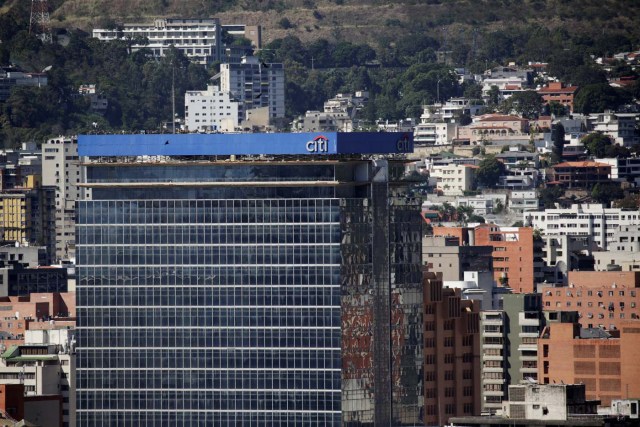 The logo of Citi is seen atop a building in Caracas, Venezuela February 8, 2017. Picture taken February 8, 2017. REUTERS/Marco Bello To match Exclusive VENEZUELA-BANKS/