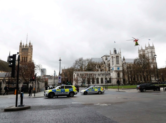An air ambulance lands in Parliament Square during an incident on Westminster Bridge in London, Britain March 22, 2017. REUTERS/Stefan Wermuth