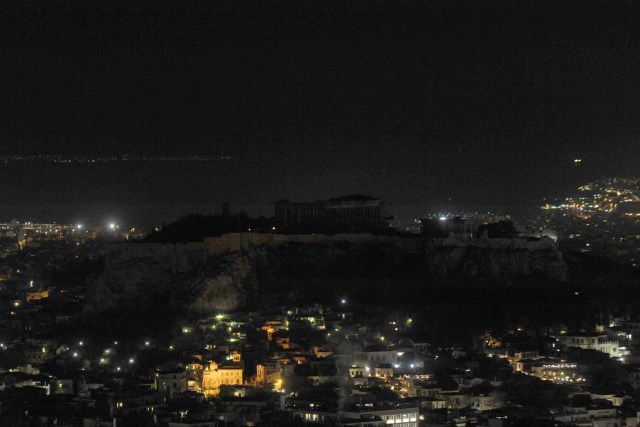 The hill of the Acropolis is pictured during Earth Hour in Athens, Greece, March 25, 2017. REUTERS/Michalis Karagiannis