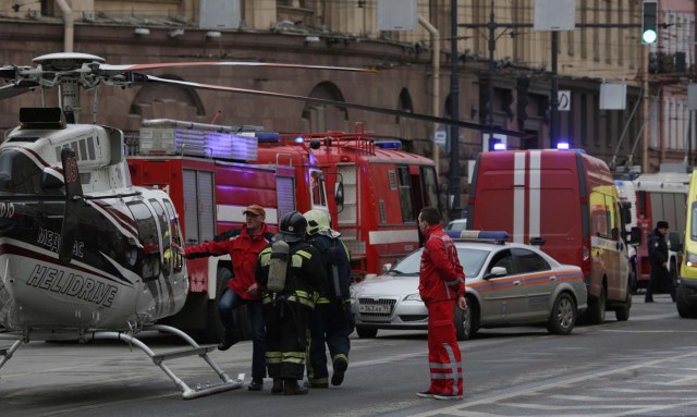General view of emergency services attending the scene outside Sennaya Ploshchad metro station, following explosions in two train carriages in St. Petersburg, Russia, April 3, 2017. REUTERS/Anton Vaganov