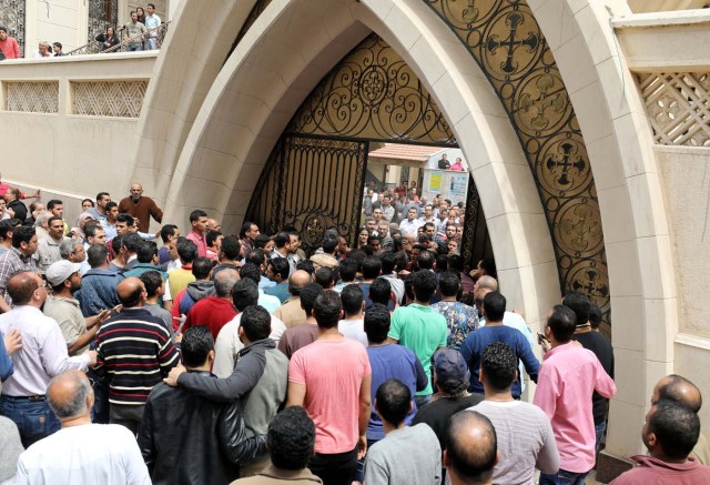 Egyptians gather in front of a Coptic church that was bombed on Sunday in Tanta, Egypt, April 9, 2017. REUTERS/Mohamed Abd El Ghany