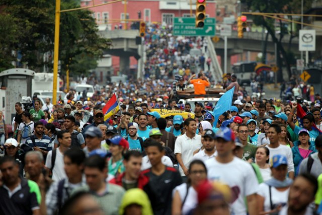 Demonstrators rally against Venezuela's President Nicolas Maduro in Caracas, Venezuela, April 13, 2017. REUTERS/Carlos Garcia Rawlins