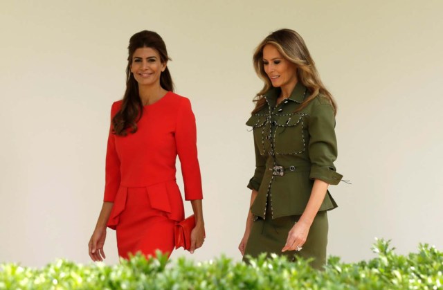 First lady Melania Trump and Argentina's first lady Juliana Awada walk the Colonnade of the White House in Washington, U.S., April 27, 2017. REUTERS/Kevin Lamarque