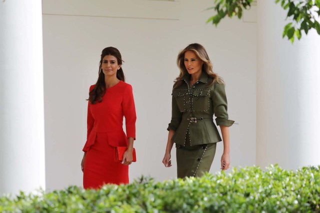 First lady Melania Trump and Argentina's first lady Juliana Awada walk the Colonnade of the White House in Washington, U.S., April 27, 2017. REUTERS/Carlos Barria