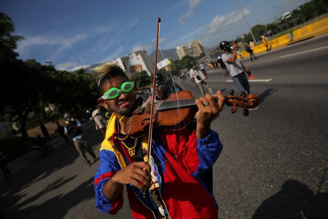 Imágenes de la movilización opositora de este #18May. REUTERS/Carlos Barria