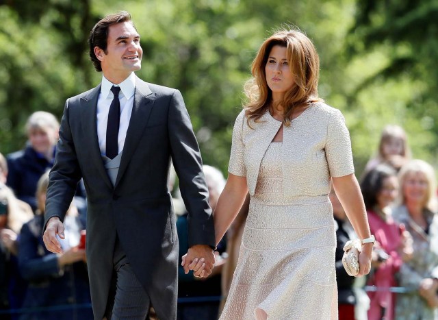 Swiss tennis player Roger Federer and his wife Mirka attend the wedding of Pippa Middleton, the sister of Britain's Catherine, Duchess of Cambridge, and James Matthews at St Mark's Church in Englefield, west of London, on May 20, 2017. REUTERS/Kirsty Wigglesworth/Pool
