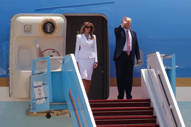 U.S. President Donald Trump (R), and his first lady Melania Trump, waves upon arrival at Ben Gurion International Airport in Lod near Tel Aviv, Israel May 22, 2017. REUTERS/Jonathan Ernst