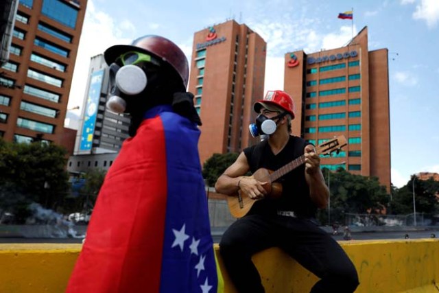 En Venezuela no se ha perdido la esperanza... Estas FOTOS lo demuestran. REUTERS/Carlos Garcia Rawlins