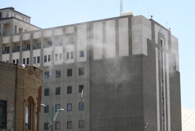 Smoke is seen during an attack on the Iranian parliament in central Tehran, Iran, June 7, 2017. Omid Vahabzadeh/TIMA via REUTERS ATTENTION EDITORS - THIS IMAGE WAS PROVIDED BY A THIRD PARTY. FOR EDITORIAL USE ONLY.