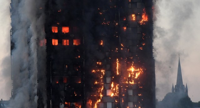 Flames and smoke engulf a tower block, in north Kensington, West London, Britain June 14, 2017. REUTERS/Toby Melville